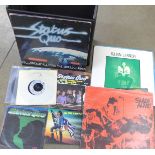 Thirteen LP records, a 12" single and 7" vinyl singles, Status Quo, Roxy Music, Quadrophenia,