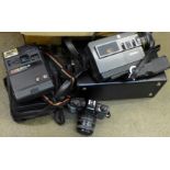 A Beaulieu camcorder, two pairs of binoculars, a Minolta X-300S film camera, Polaroid camera, etc.