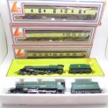 Two Hornby locomotives, Princess Victoria and King Edward I, boxed and three Lima carriages,