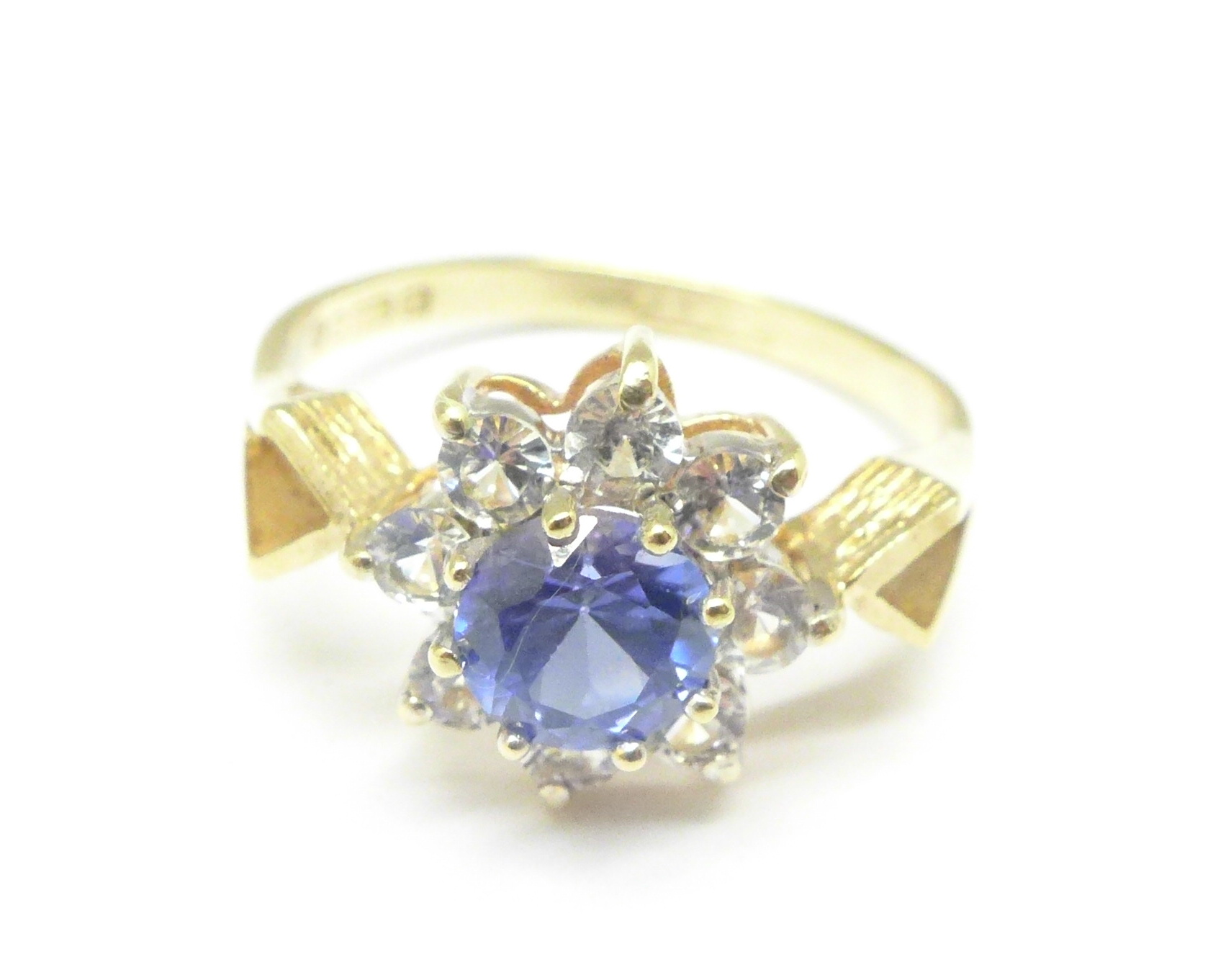 A 9ct gold, tanzanite and white stone ring, 2.