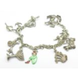 A sterling silver charm bracelet, some charms white metal, 39.