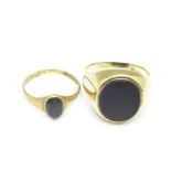 Two 9ct gold and black onyx rings, 8.