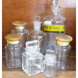 Seven glass chemist jars