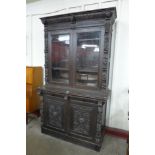 A 19th Century French carved oak bookcase