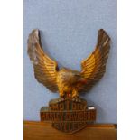 A Harley Davidson advertising eagle plaque