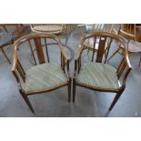 A pair of Edward VII mahogany tub chairs