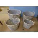 A set of three graduated wicker baskets