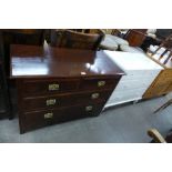 A walnut chest of drawers and a painted chest of drawers