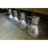 A set of four industrial metal ceiling lights