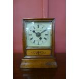 A 19th Century Irish inlaid oak mantel clock, the dial signed Schreiber Bros,