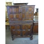 An oak cocktail cabinet