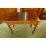 A George III inlaid mahogany fold-over tea table