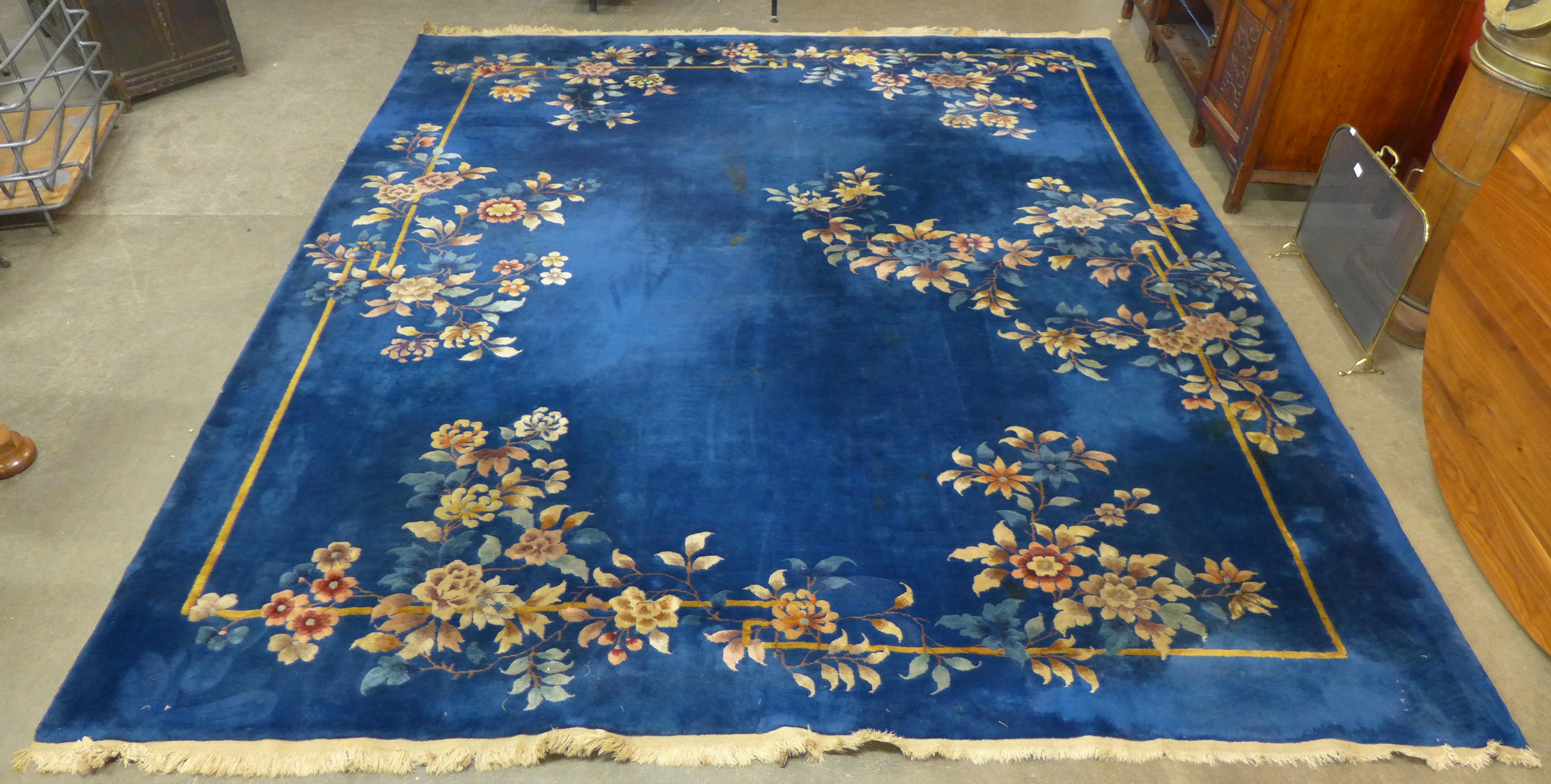 A large Chinese blue ground rug