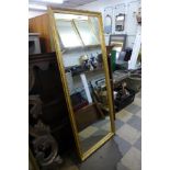 A large gilt framed mirror