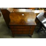 A Queen Anne style walnut bureau de dame