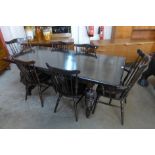 An elm and beech refectory table and six chairs