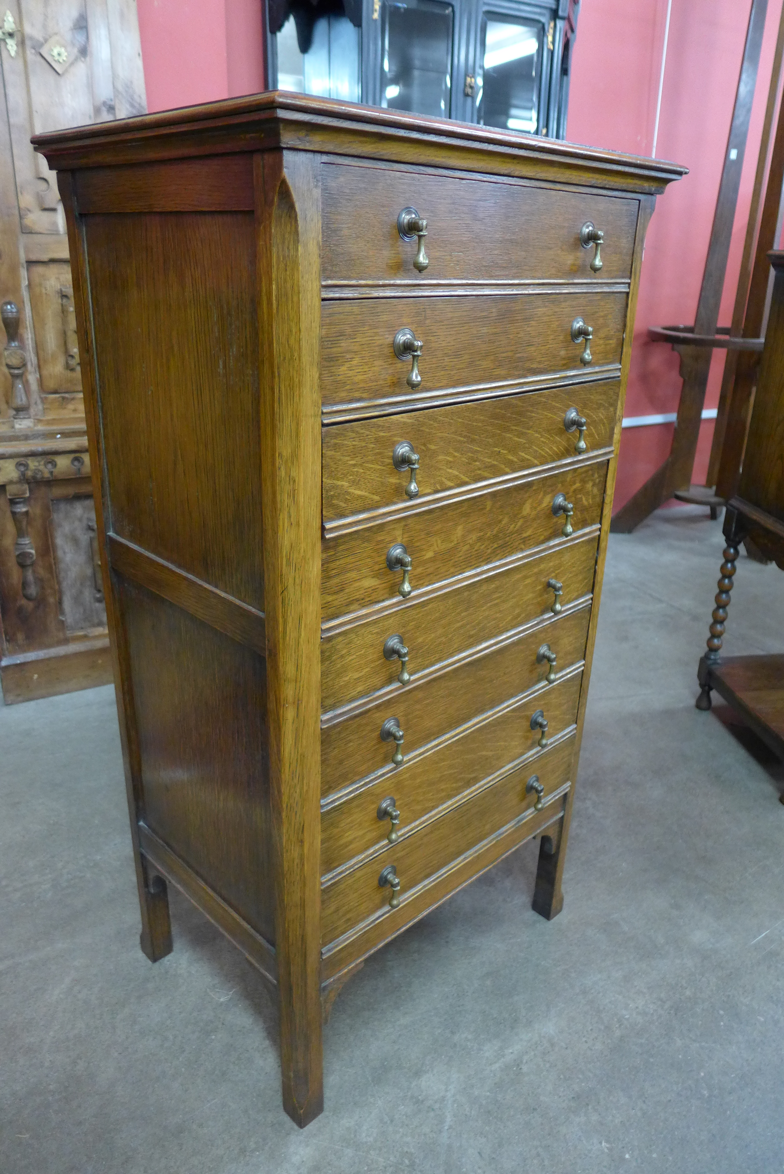 An Edward VII oak music cabinet