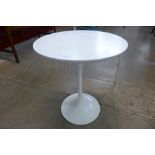 An Arkana tulip shaped coffee table,