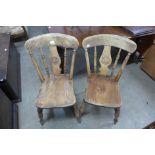 A pair of Victorian beech kitchen chairs