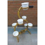 A bamboo jardiniere stand