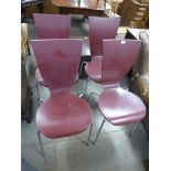 A set of four chrome and plywood chairs