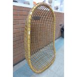 A 1960's wicker hanging chair