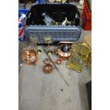 A box of copper and brassware including a pestle and mortar, two kettles, candlesticks, etc.