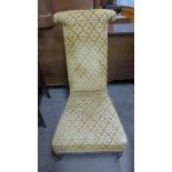A Victorian walnut and upholstered prie dieu