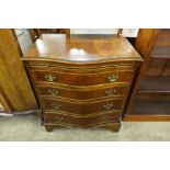 A mahogany serpentine chest of drawers