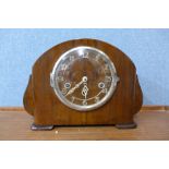 A walnut mantel clock