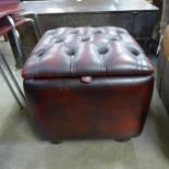 A brown leather ottoman