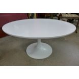 An Arkana tulip shaped coffee table,