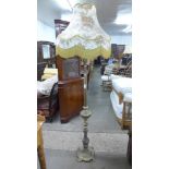 A brass standard lamp