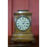 A 19th Century Irish walnut and marquetry inlaid bracket clock. the dial signed Beringer Bros.