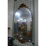 A gilt framed mirror