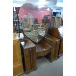 A walnut dressing table