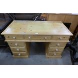 A pine pedestal desk