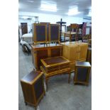 A Dynatron walnut and yew wood cased stereogram with four matching speakers and cabinet