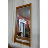 A teak framed hall mirror