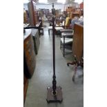 A Victorian mahogany pole stand