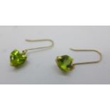 A pair of 9ct gold and peridot earrings