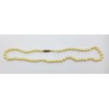 A cultured pearl necklace with 9ct gold clasp