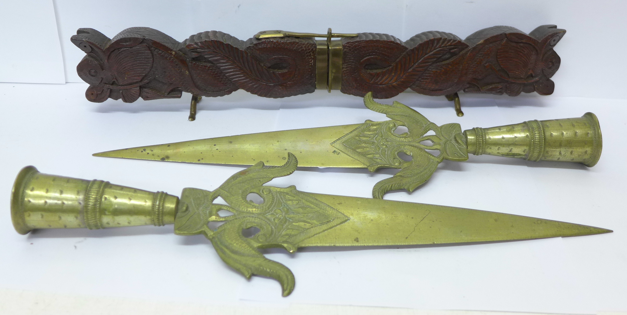 Two South Indian brass lance heads and a Middle Eastern carving knife