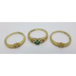 A 9ct gold, emerald and diamond triple ring, 4.