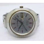 A Citizen automatic calendar date wristwatch