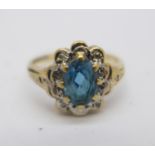 A 9ct gold, blue stone and diamond ring, 1.