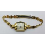 A lady's 9ct gold cased cocktail wristwatch, weight of case back 2.