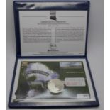 A limited edition Flying Scotsman silver £5 commemorative coin cover