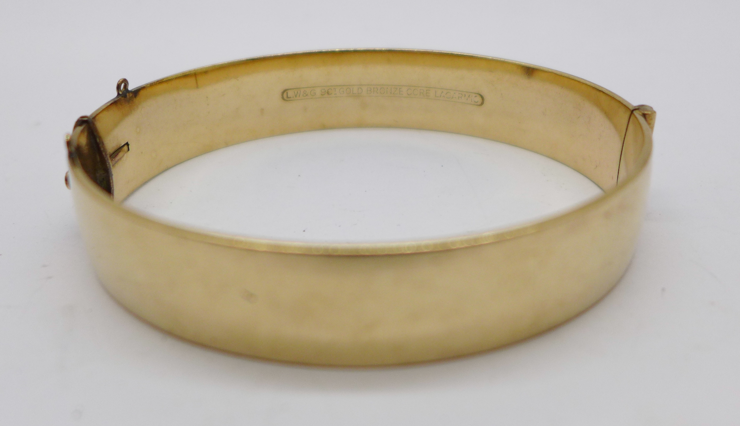 A 9ct gold bronze core bangle - Image 2 of 2