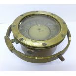 A marine gimbal brass compass